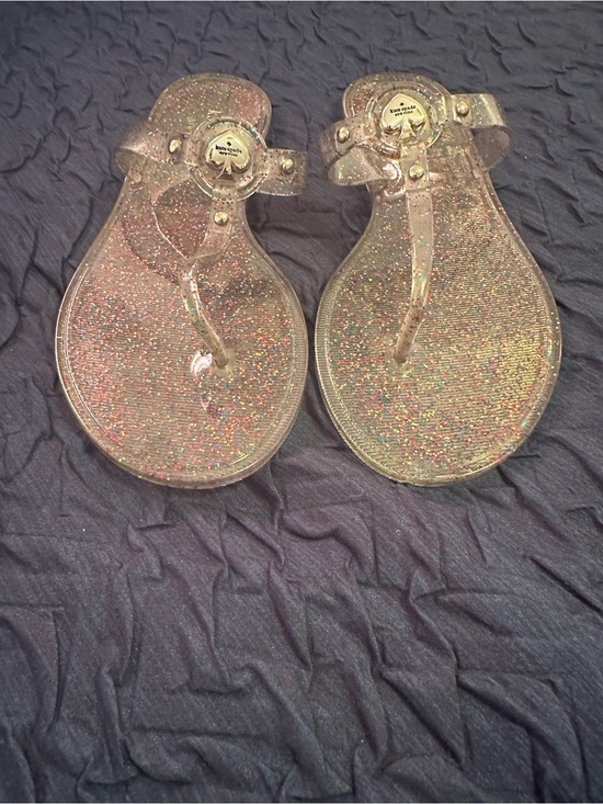 kate spade Shoes - kate spade Clear Iridescent Glitter Jelly Sandals with Gold Logo